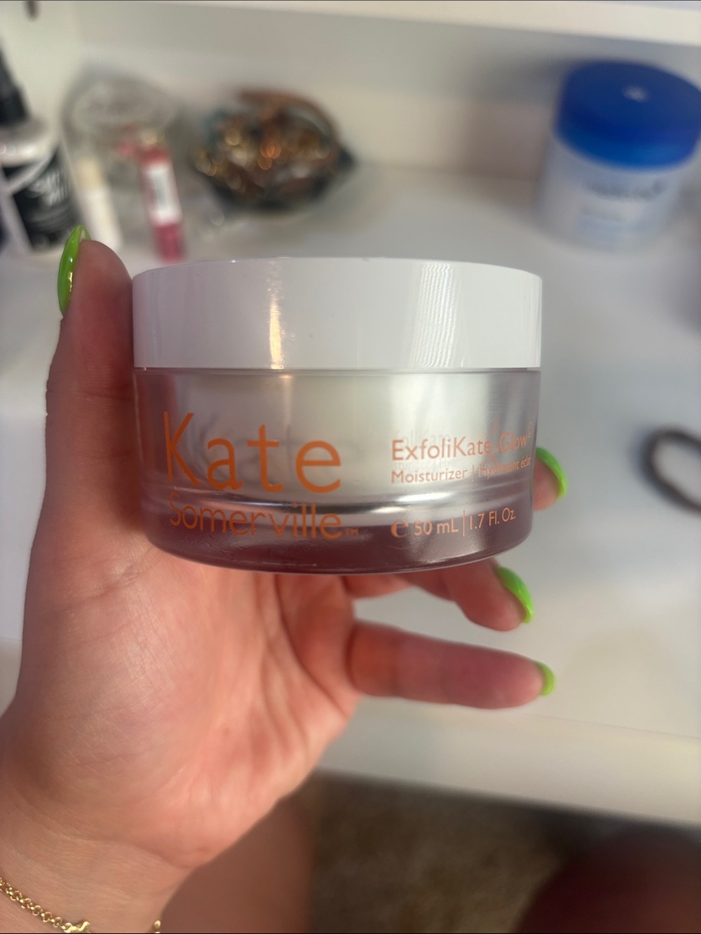 Kate Somerville ExfoliKate Glow Moisturizer - White with Orange Logo